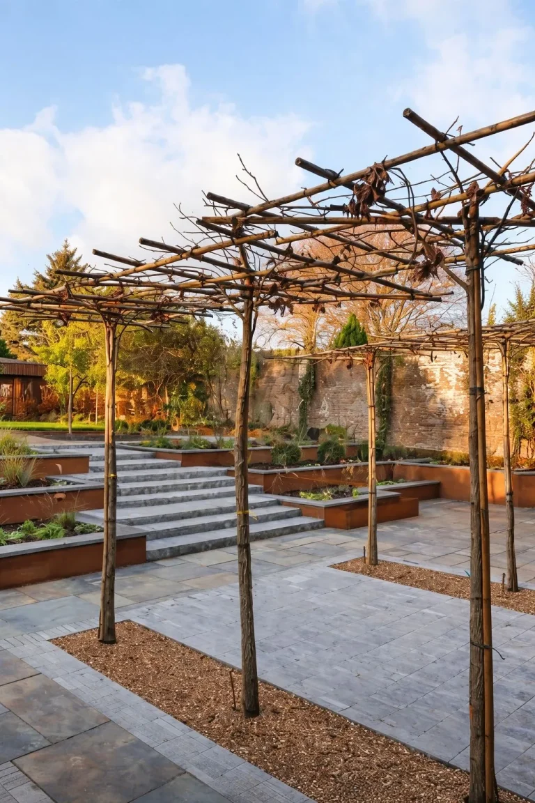 Surrey garden transformed with timber pergola and stone terrace